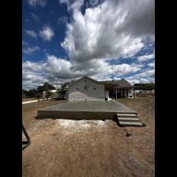 Expert concrete solutions in San Antonio, specializing in patios, driveways, foundations, and custom decorative work.